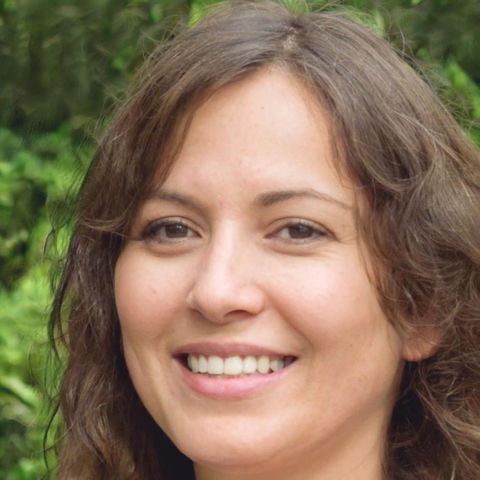 Lead instructor demonstrating advanced seasonal arrangement techniques